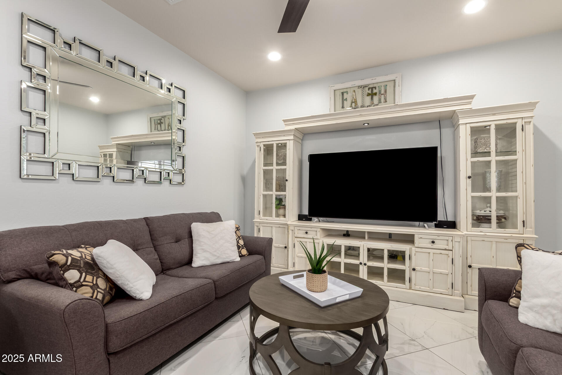 6641 West Georgetown Way Florence, AZ 85132 - Photo 6 of 35 a living room with furniture and a flat screen tv