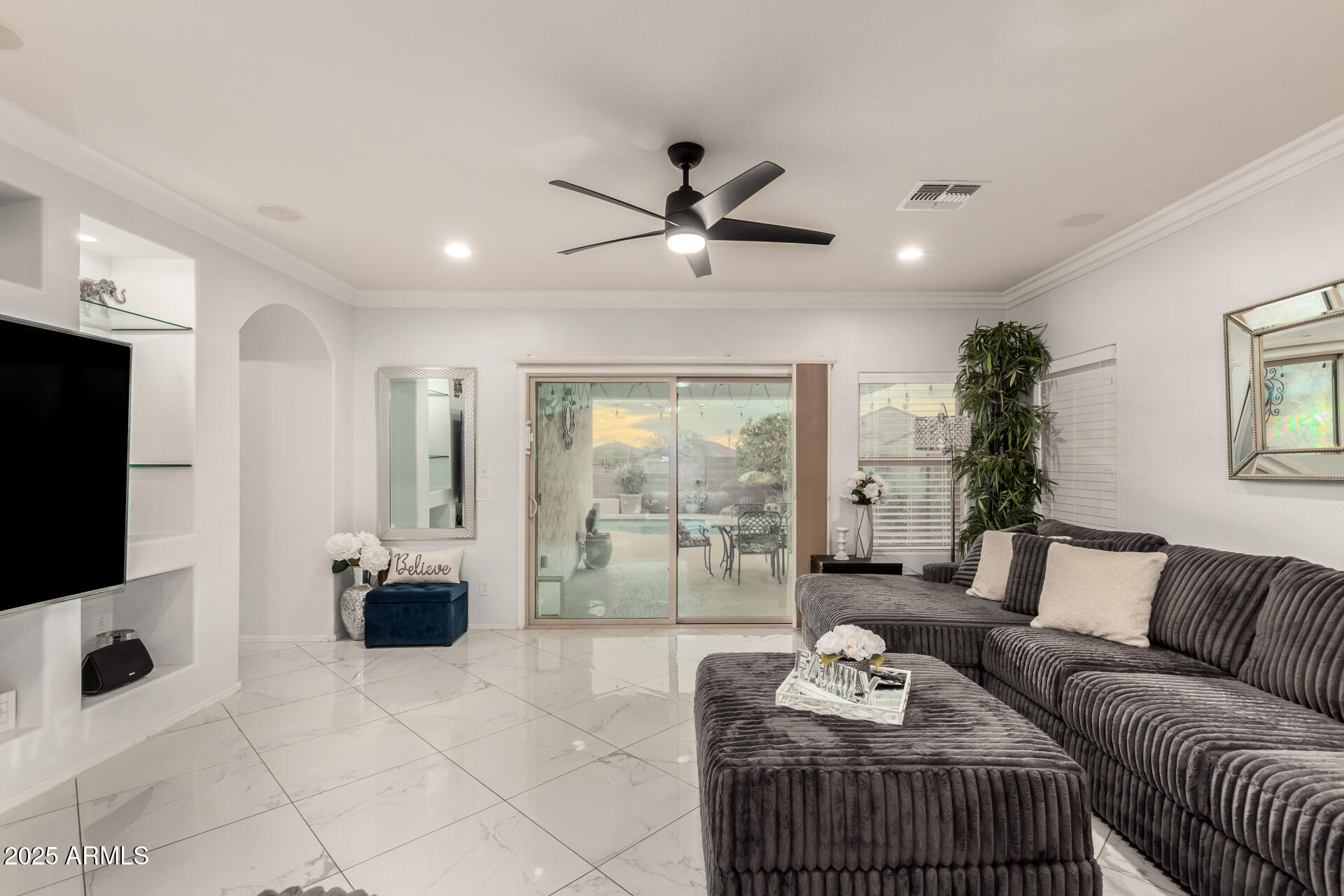 6641 West Georgetown Way Florence, AZ 85132 - Photo 8 of 35 a living room with furniture and a flat screen tv