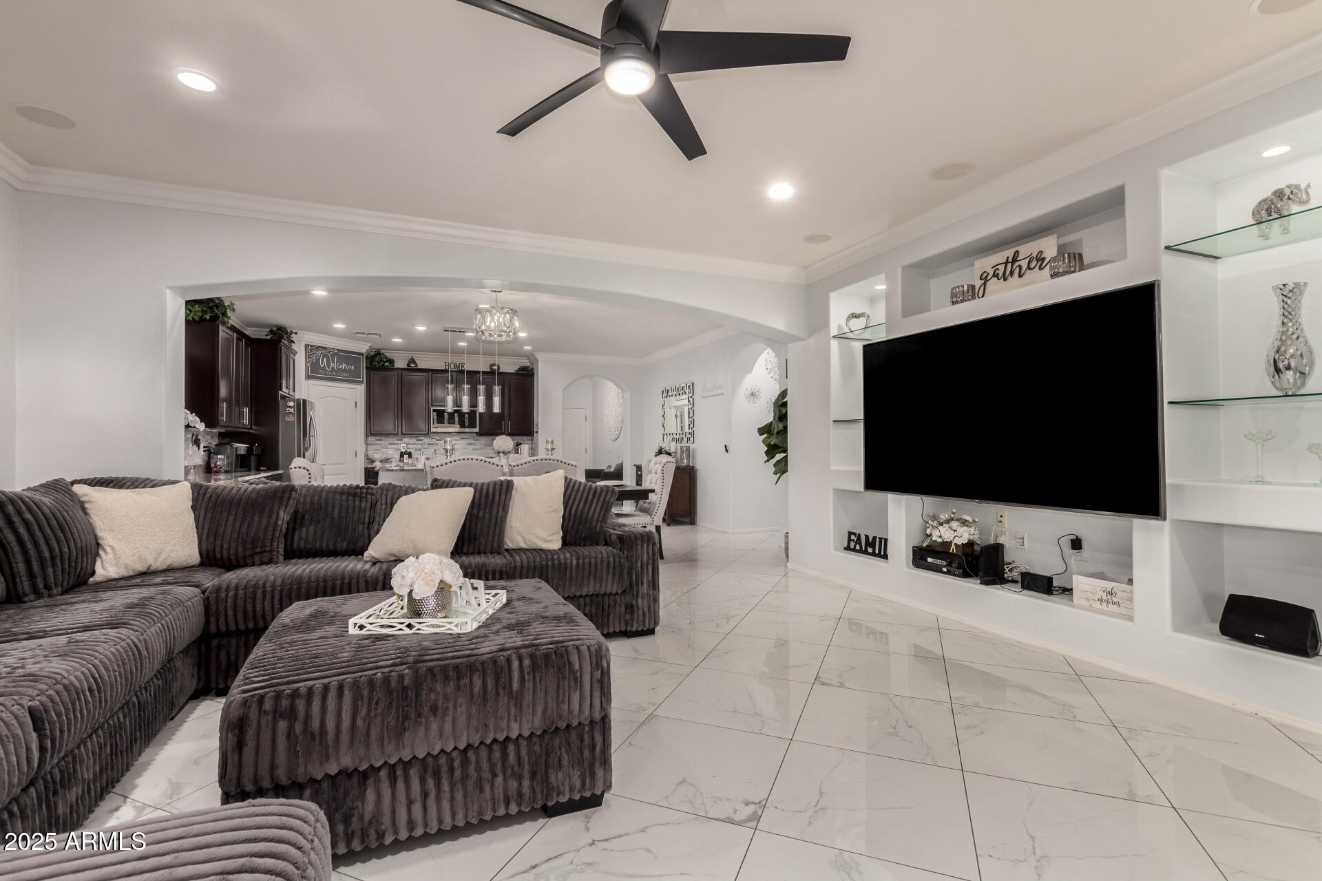 6641 West Georgetown Way Florence, AZ 85132 - Photo 9 of 35 a living room with furniture and a flat screen tv