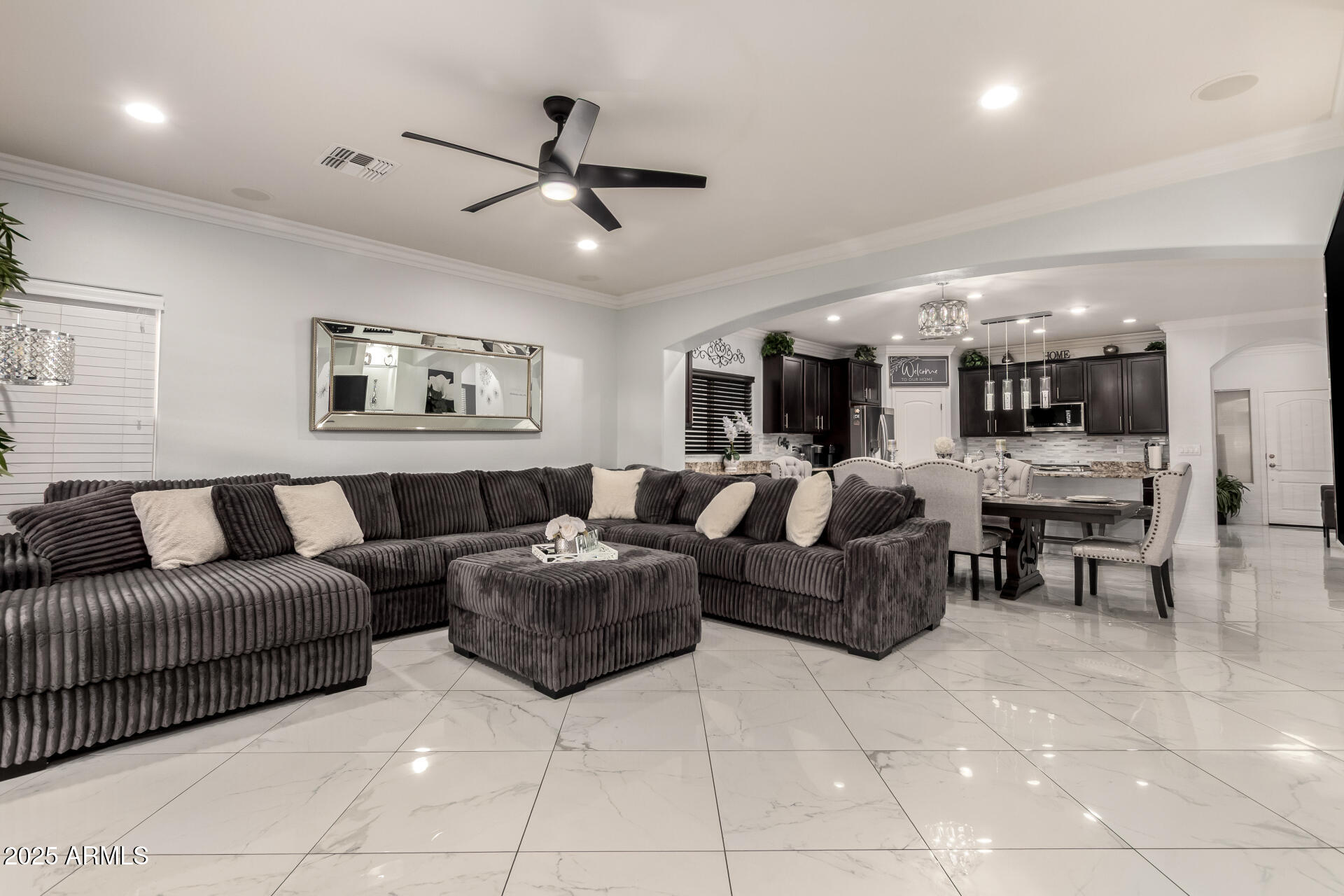 6641 West Georgetown Way Florence, AZ 85132 - Photo 10 of 35 a living room with furniture and kitchen view
