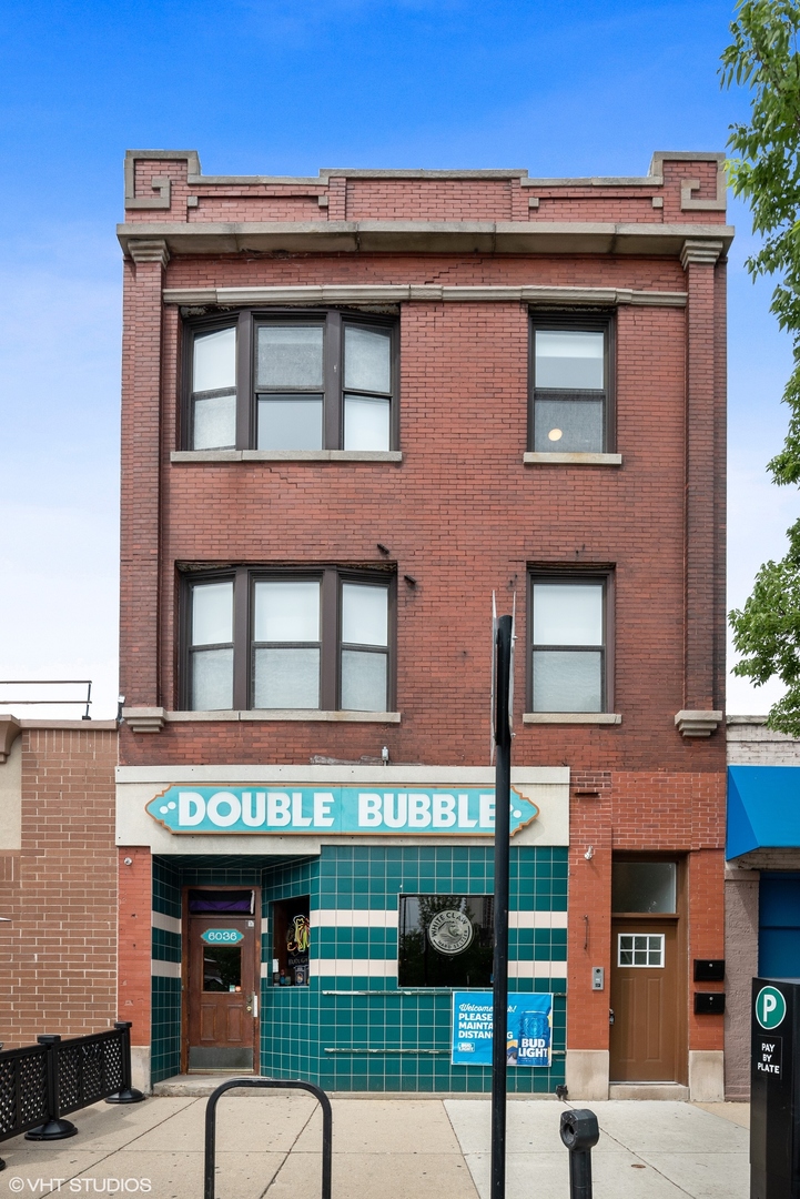 6036 North Broadway, Unit 3 Chicago, IL 60660 - Photo 1 of 17 a building with glass windows