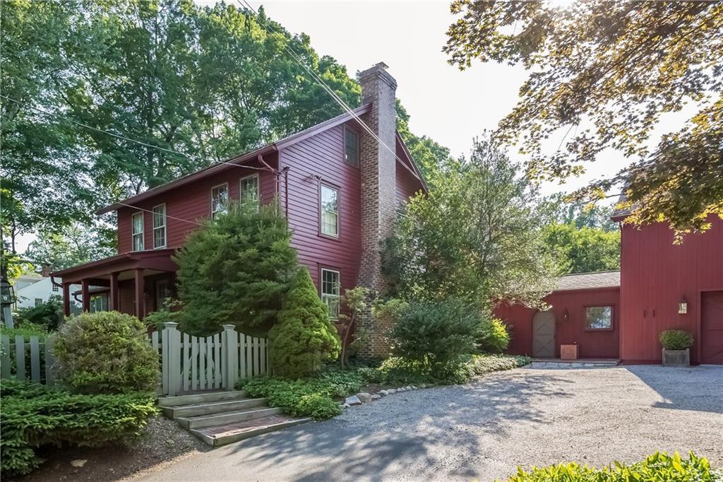 381 Wilton Road West Ridgefield, CT 06877 - Photo 1 of 1 a view of a house with a yard and plants