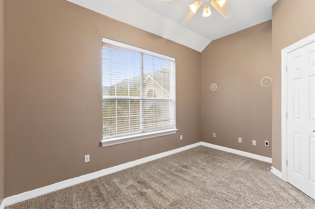 4106 Oberlin Way Addison, TX 75001 - Photo 15 of 17 a view of an empty room with a window