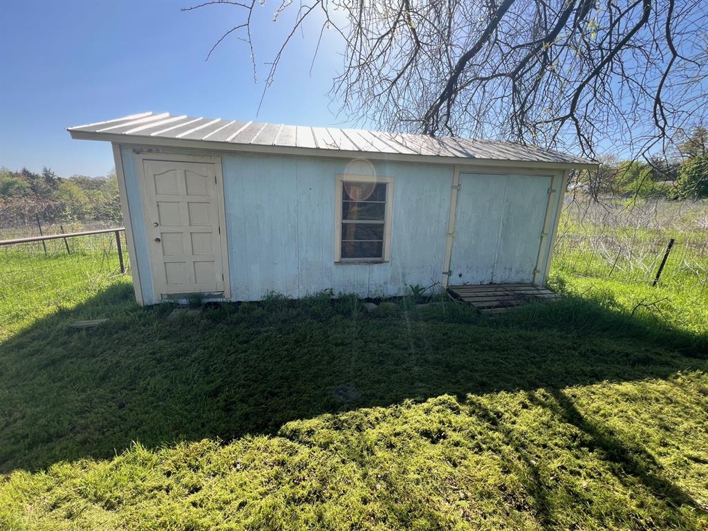 41 Kelsey Road Denison, TX 75021 - Photo 30 of 31 Storage shed