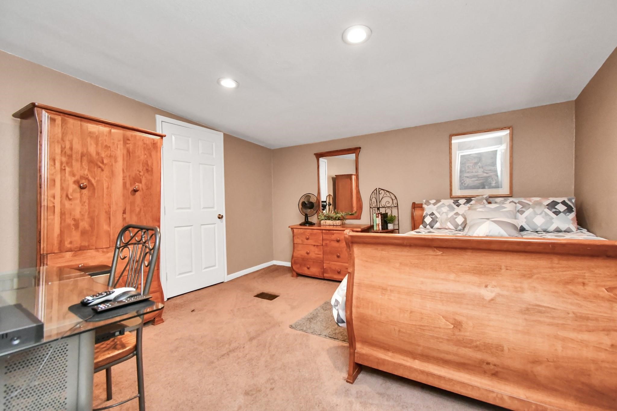 24998 Sorters Road Porter, TX 77365 - Photo 32 of 39 a bed room with a bed and a window