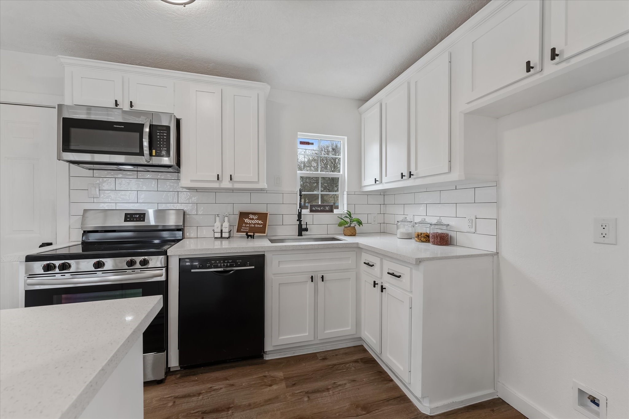 4915 Andrea Street Houston, TX 77021 - Photo 13 of 19 Amazing kitchen with stainless steel appliances, an abundance of cabinetry, and TONS of counter space with granite countertops.