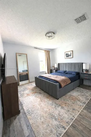 a bathroom with a tub and a shower