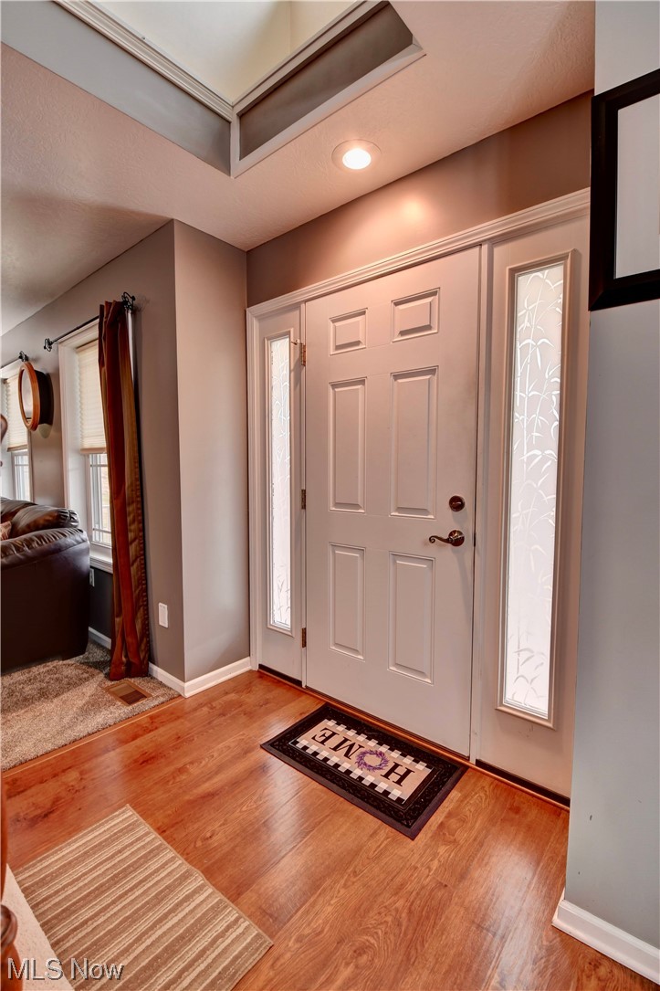 4301 Murray Road Dover, OH 44622 - Photo 5 of 49 Entryway with light hardwood / wood-style flooring