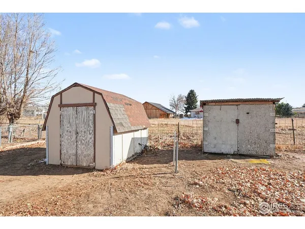 a front view of a house with snow