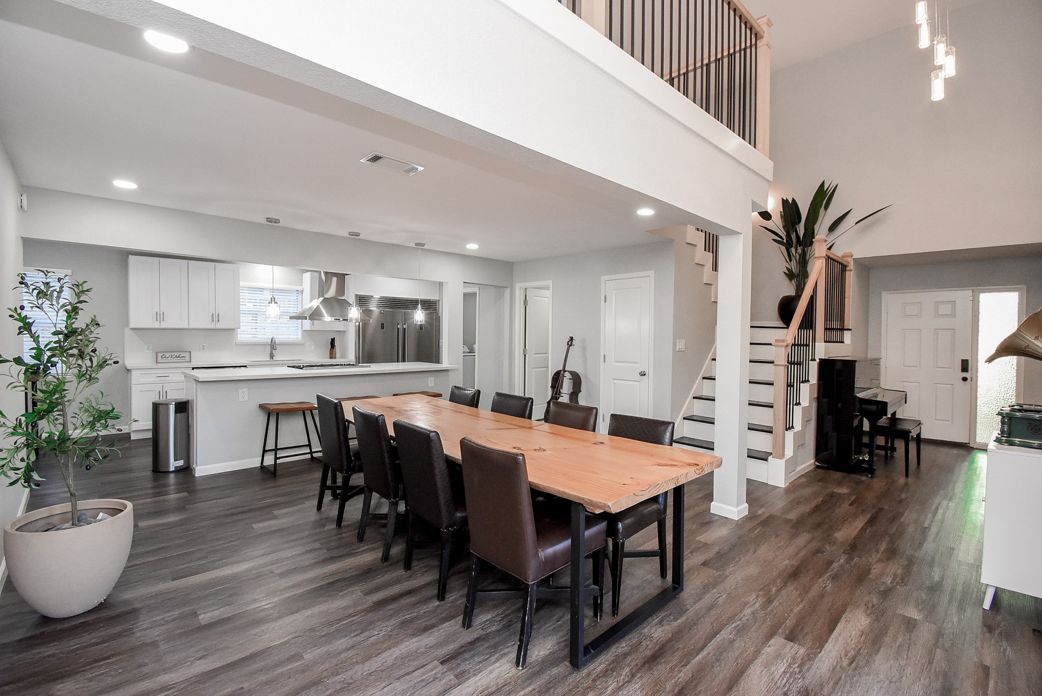 12435 Shepherds Ridge Drive Houston, TX 77077 - Photo 16 of 47 a view of a dining room with furniture and wooden floor