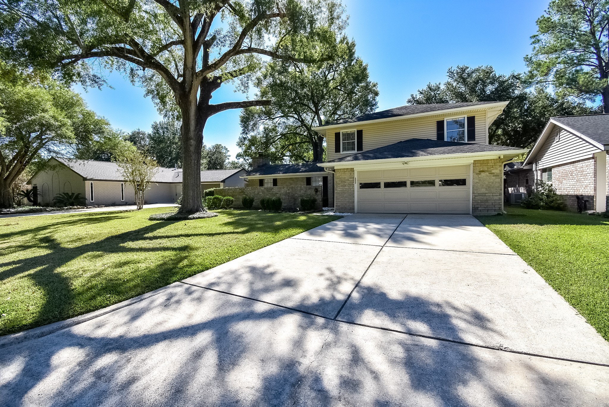 12435 Shepherds Ridge Drive Houston, TX 77077 - Photo 2 of 47 a view of a house with a yard