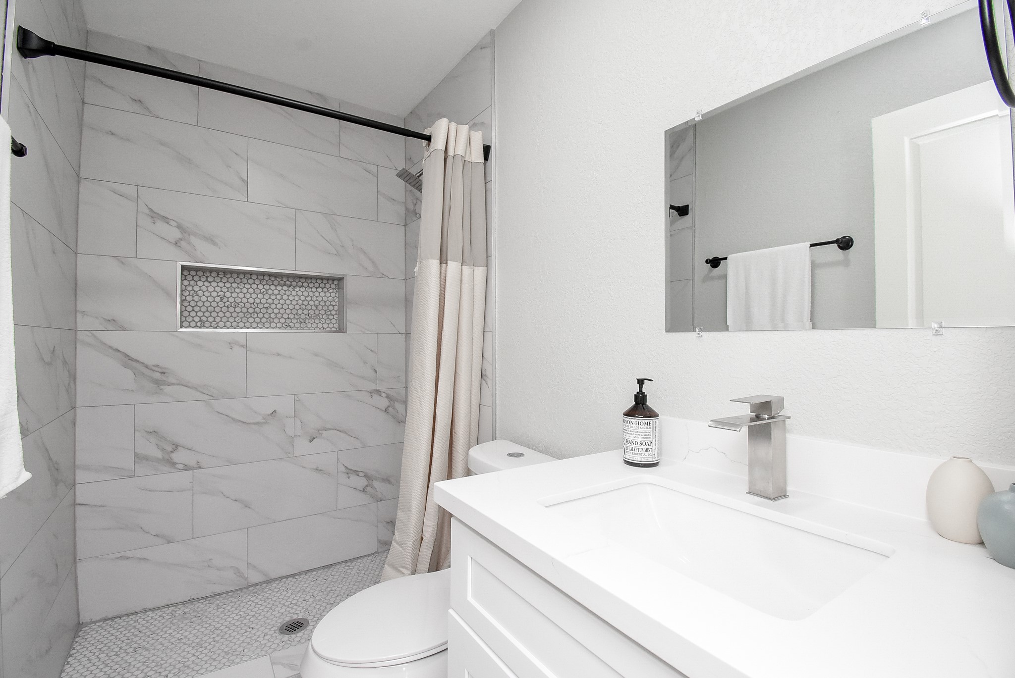 12435 Shepherds Ridge Drive Houston, TX 77077 - Photo 24 of 47 a bathroom with a sink toilet and shower