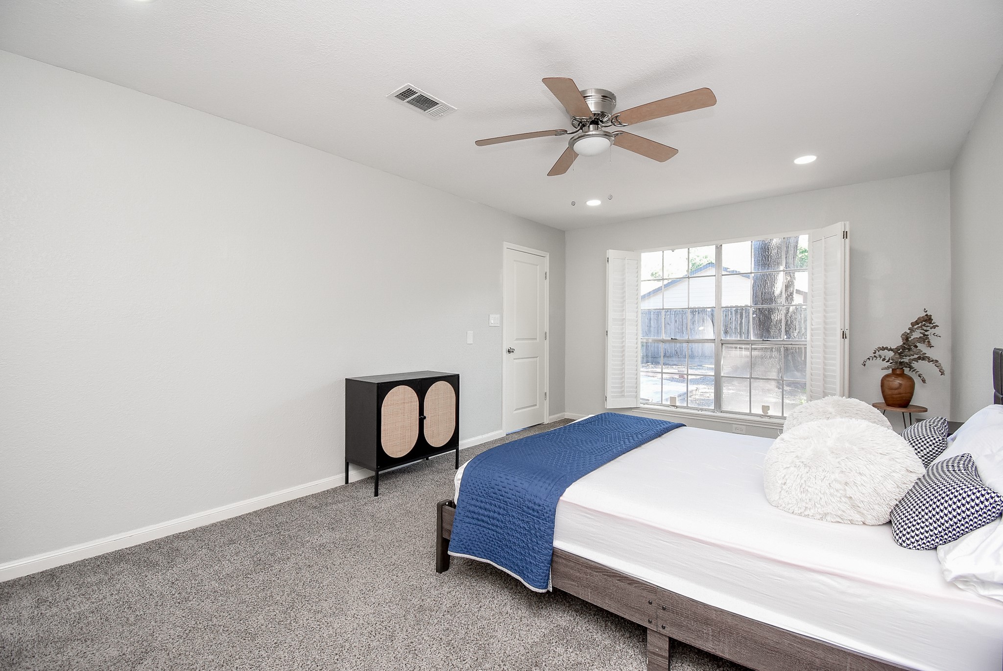 12435 Shepherds Ridge Drive Houston, TX 77077 - Photo 26 of 47 a bedroom with a bed and window