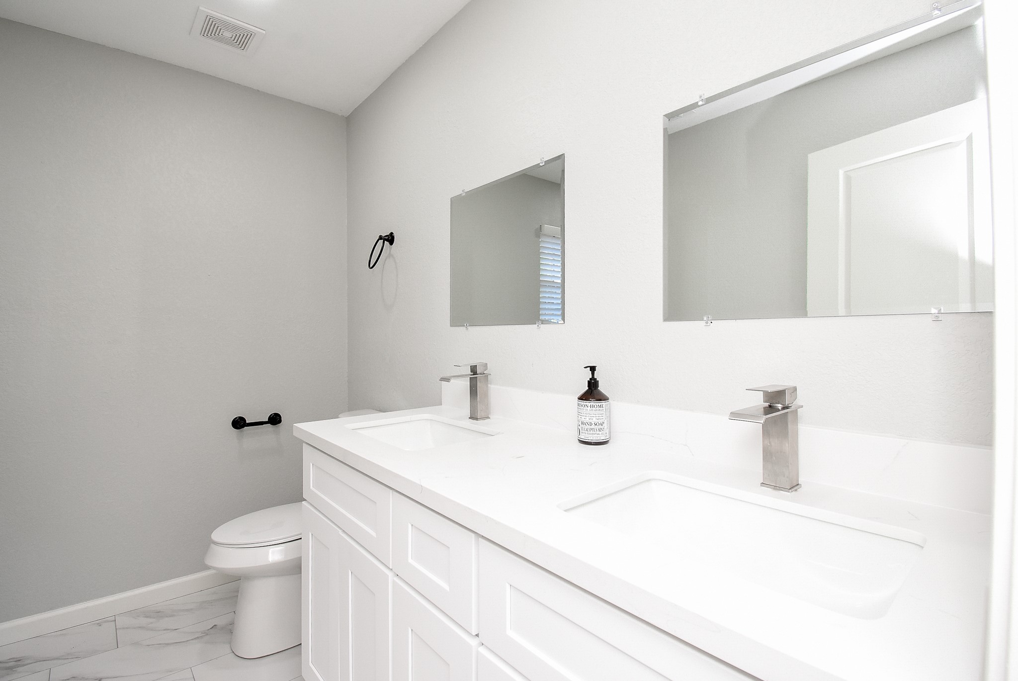 12435 Shepherds Ridge Drive Houston, TX 77077 - Photo 27 of 47 a bathroom with a sink a toilet and a mirror