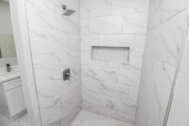 a view of staircase with wooden floor and a potted plant