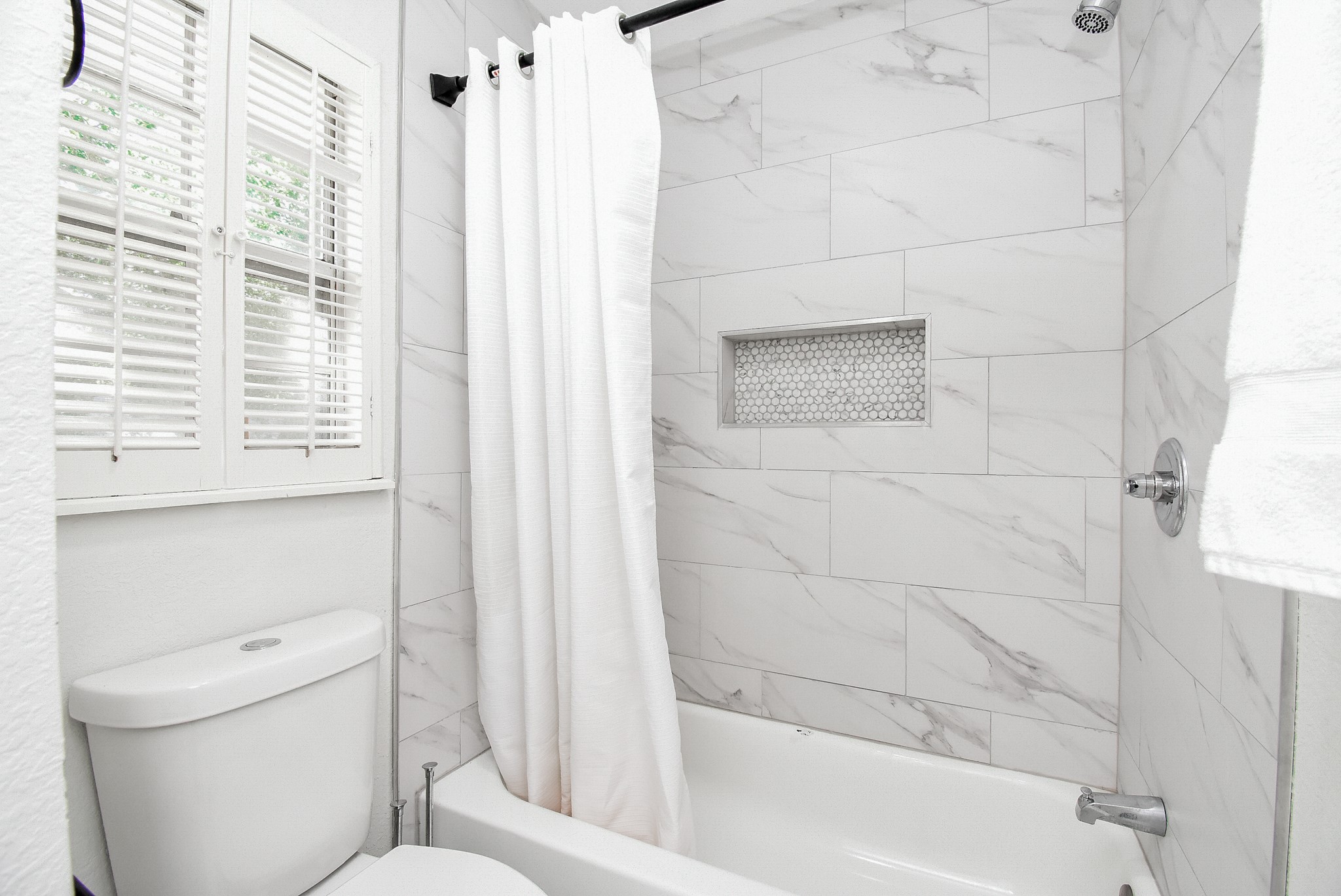 12435 Shepherds Ridge Drive Houston, TX 77077 - Photo 39 of 47 a bathroom with a toilet and a bathtub