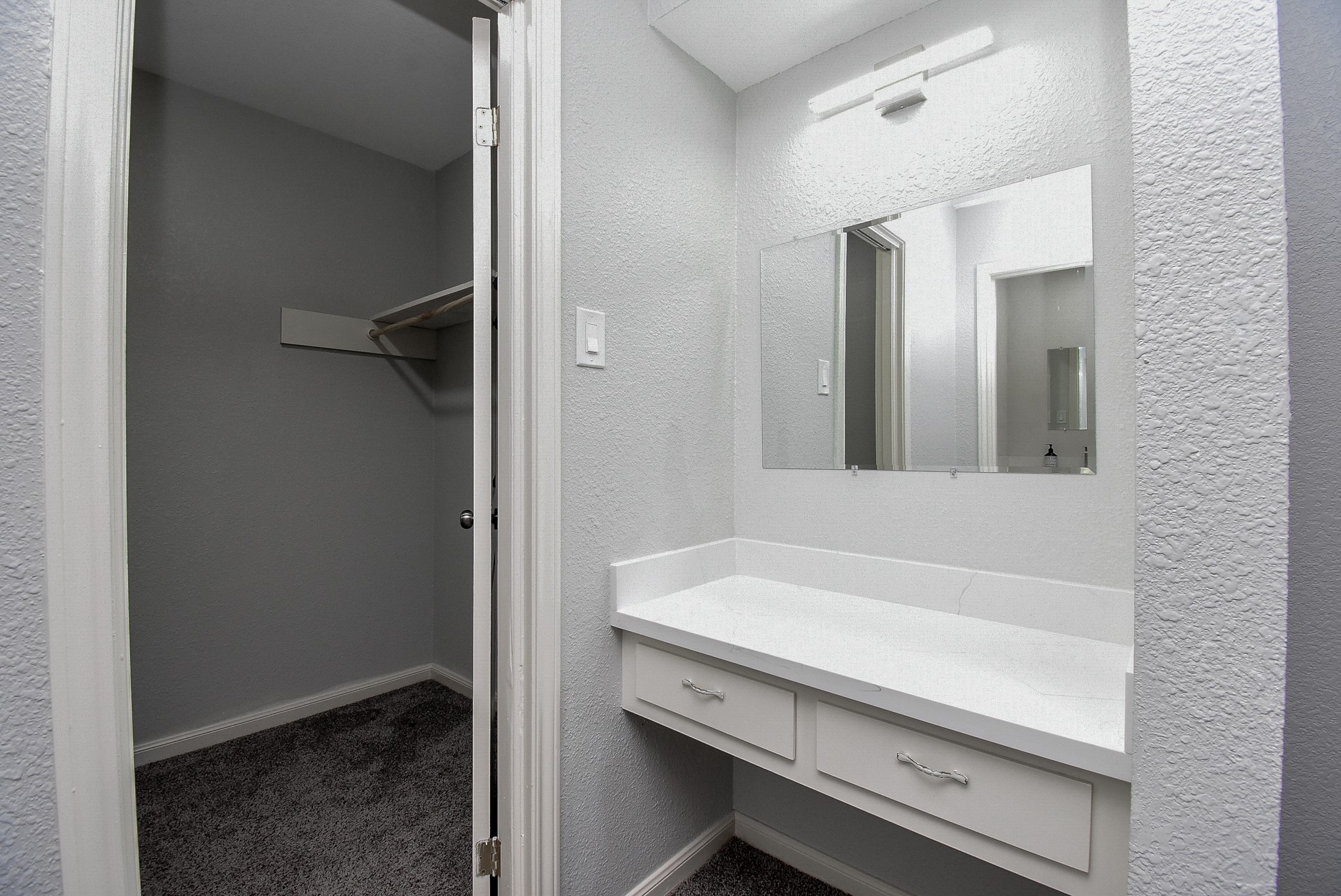 12435 Shepherds Ridge Drive Houston, TX 77077 - Photo 40 of 47 a bathroom with a sink and a mirror
