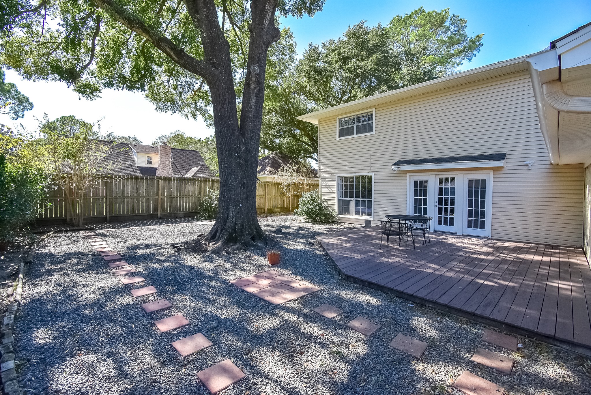 12435 Shepherds Ridge Drive Houston, TX 77077 - Photo 42 of 47 a view of a house with backyard and sitting area