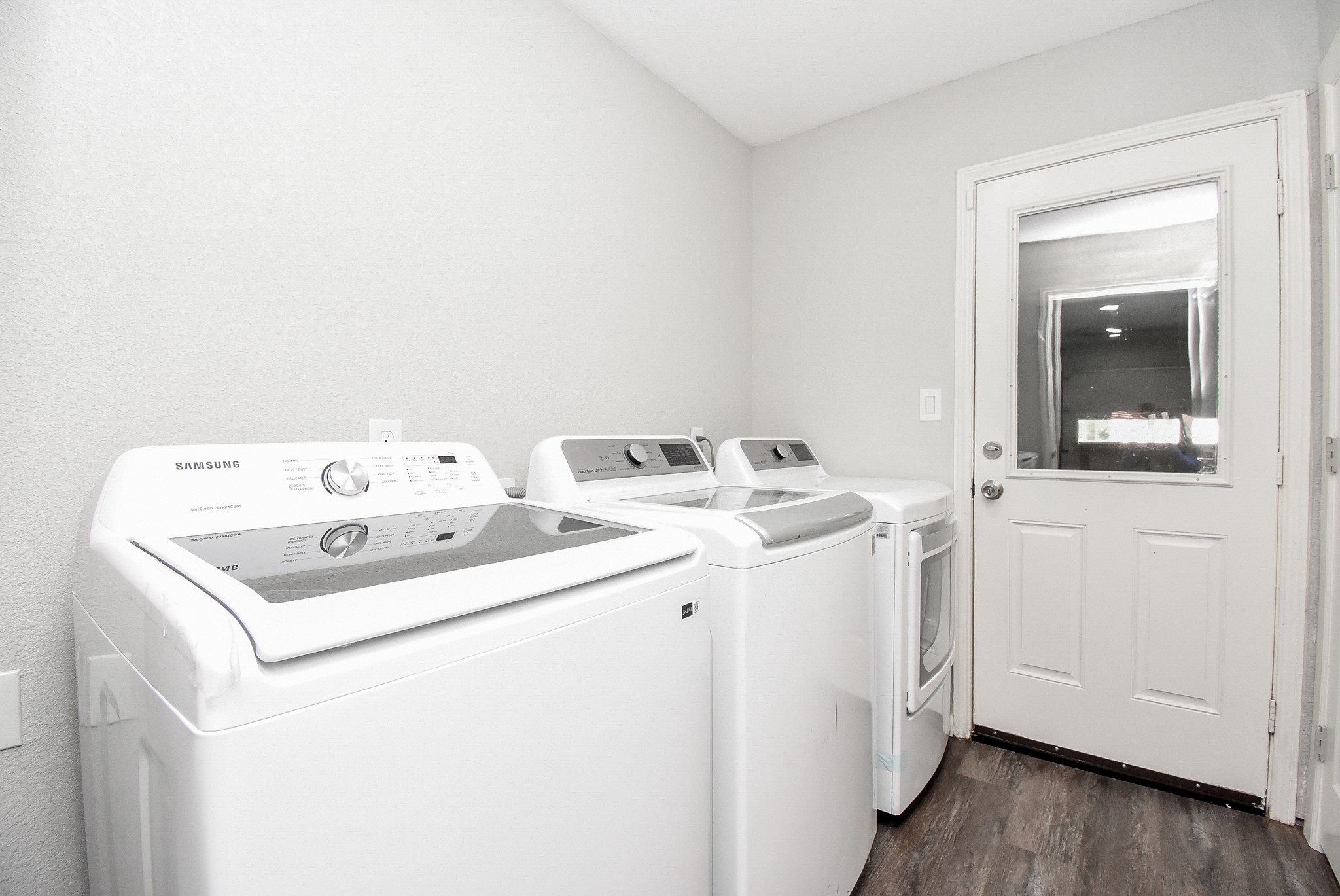 12435 Shepherds Ridge Drive Houston, TX 77077 - Photo 46 of 47 a utility room with dryer and washer
