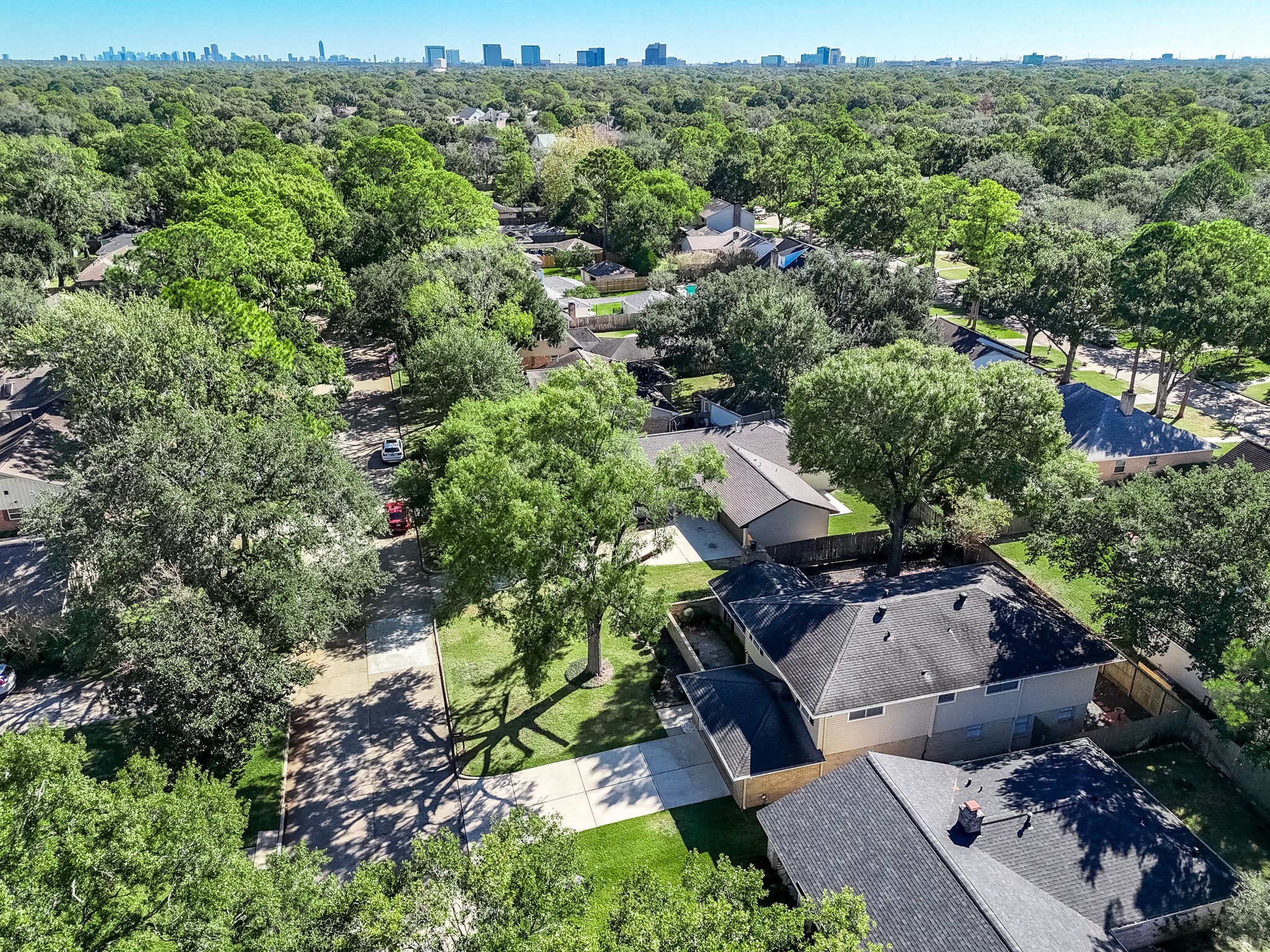 12435 Shepherds Ridge Drive Houston, TX 77077 - Photo 6 of 47 an aerial view of a house with yard