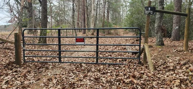 a view of a wooden fence and a window