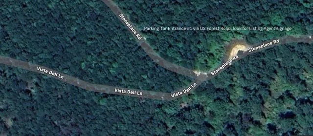 a view of a lake with a park