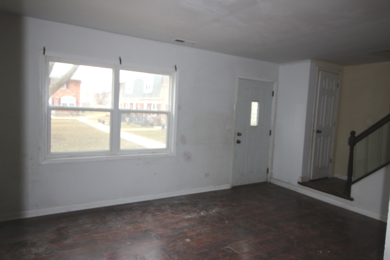 1723 McKool Avenue Streamwood, IL 60107 - Photo 4 of 11 a view of an empty room with a window
