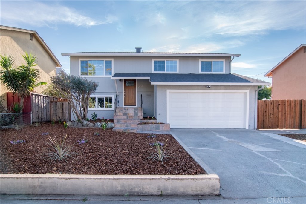 1353 Karl Street San Jose, CA 95122 - Photo 1 of 34 a front view of a house with garden