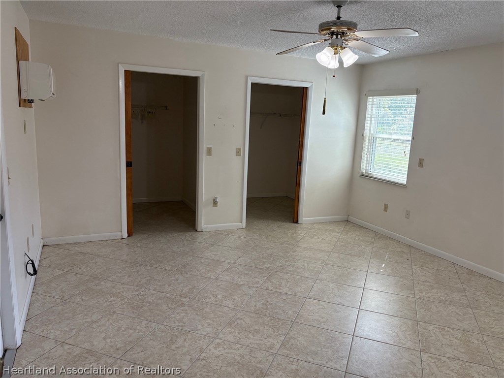 3913 Ferrari Drive Sebring, FL 33872 - Photo 19 of 20 a view of an empty room with a window