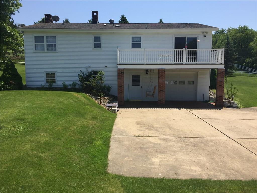 177 Ford City Road Freeport, PA 16229 - Photo 3 of 25 Back view of split level showing upper deck off DR and shaded patio under.