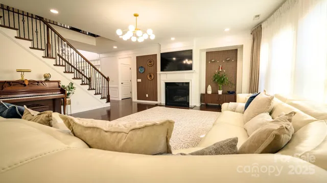 a spacious bathroom with a tub sink and mirror