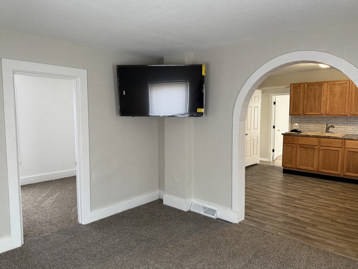 513 Barney Riva Street Dalzell, IL 61320 - Photo 5 of 39 a view of a kitchen from a hallway