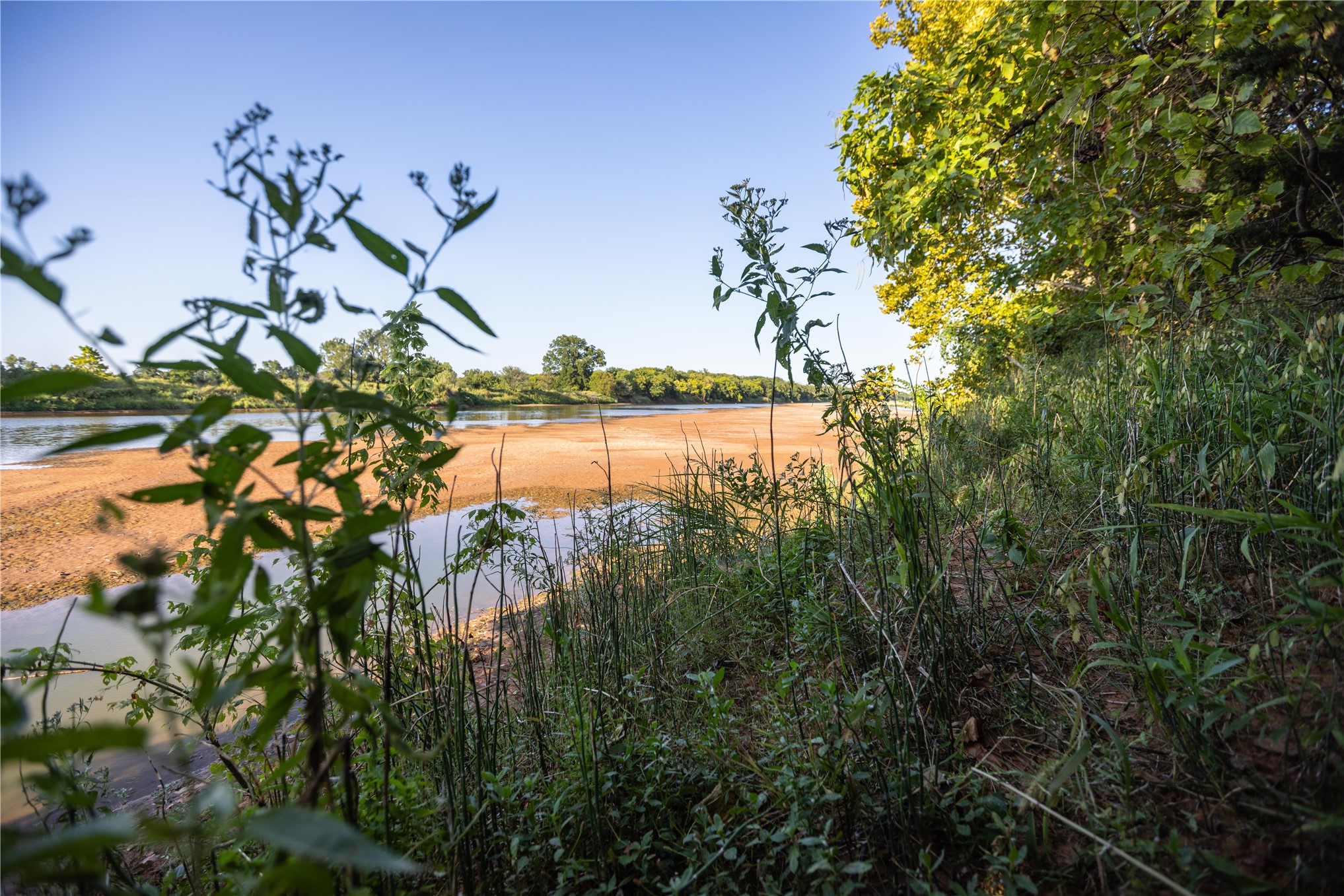 0 West Dunkin Road Cushing, OK 74023 - Photo 48 of 62 Natural river frontage with established trees and diverse greenery