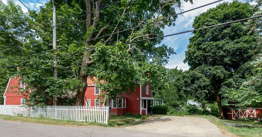 48 Turkey Shore Road Ipswich, MA 01938 - Photo 19 of 28 a view of a house with a yard and plants