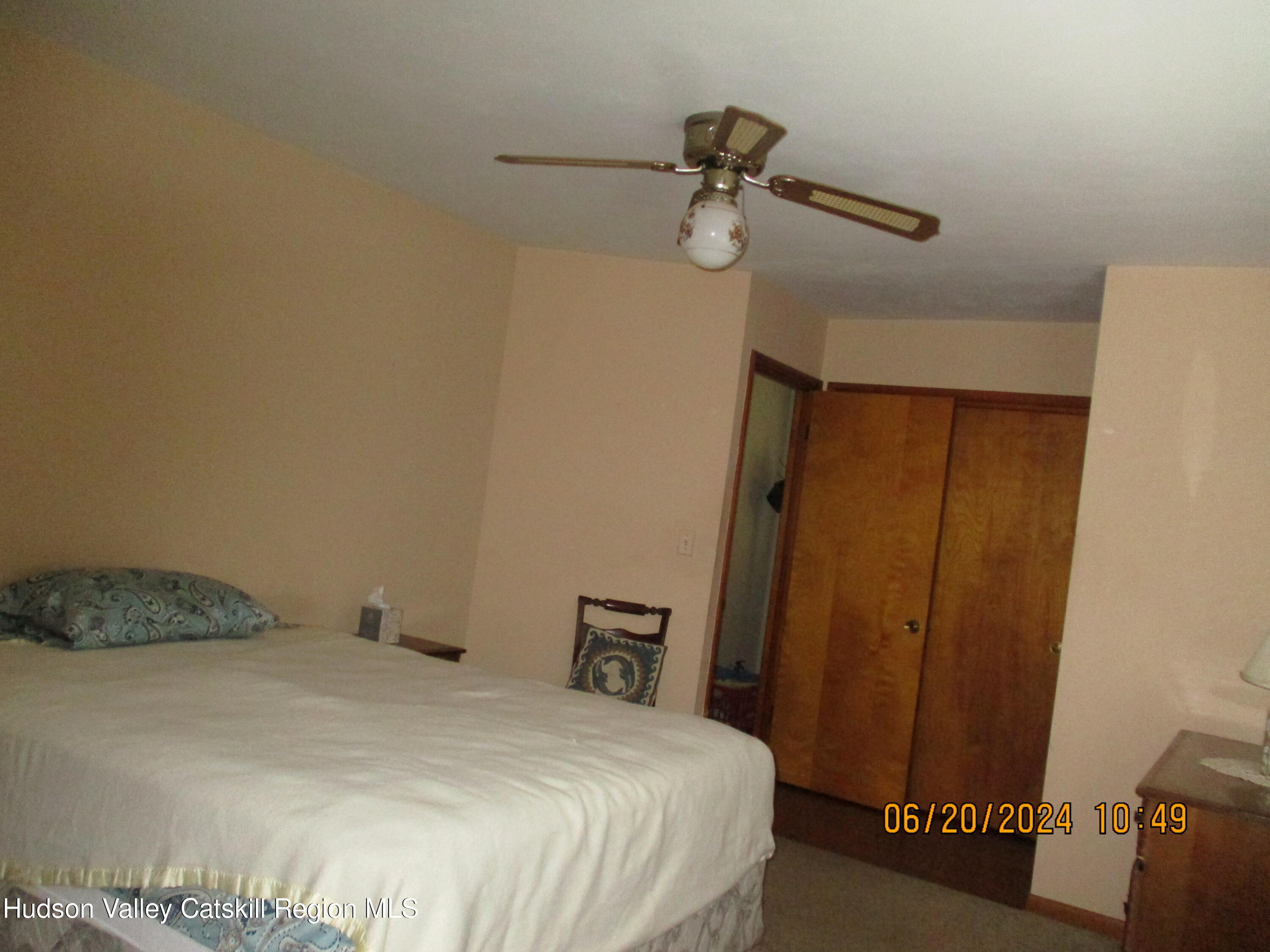 611 Plainfield Street Kingston, NY 12401 - Photo 18 of 27 a bedroom with a bed and a mirror