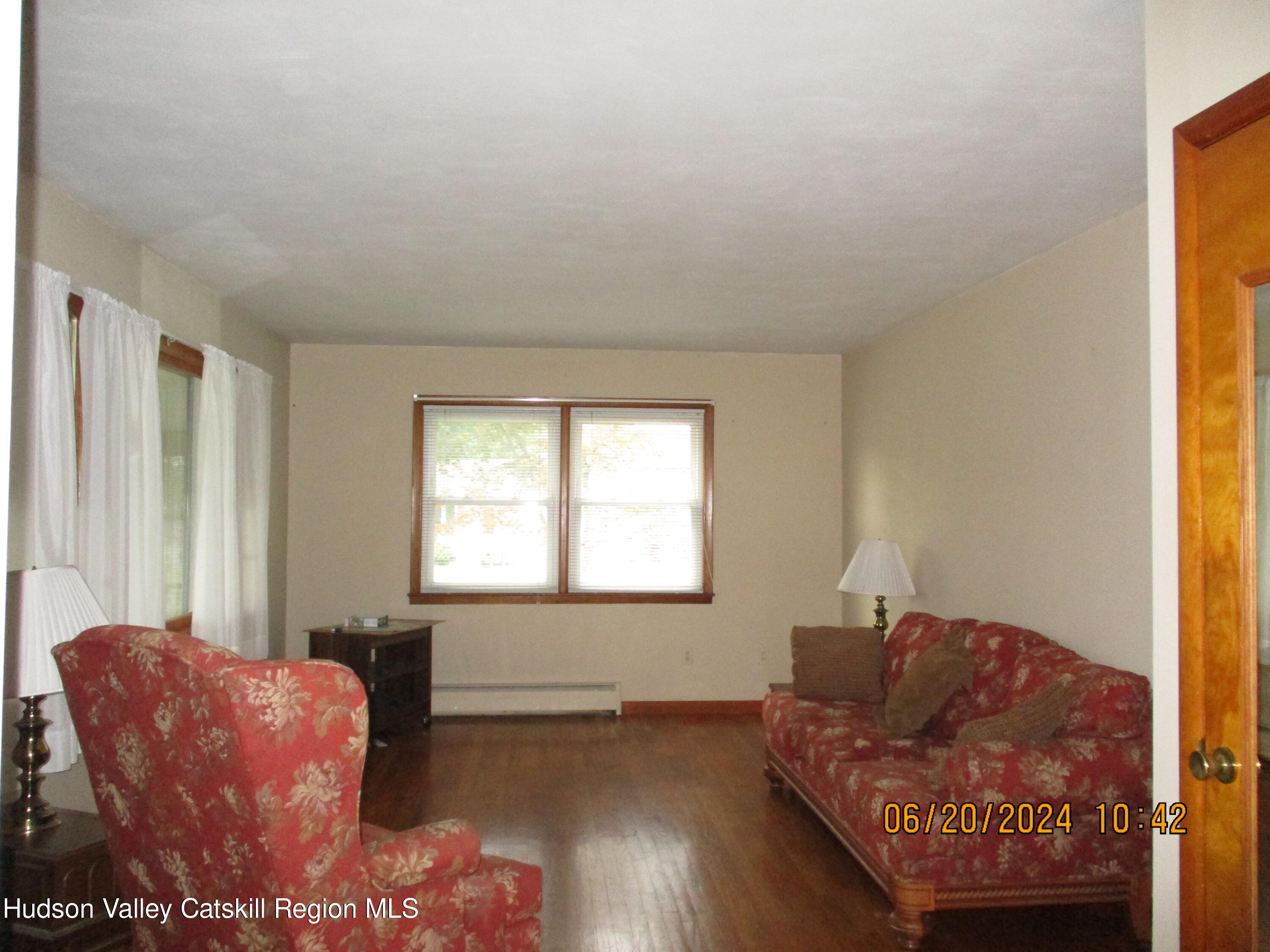 611 Plainfield Street Kingston, NY 12401 - Photo 3 of 27 a living room with furniture and a window