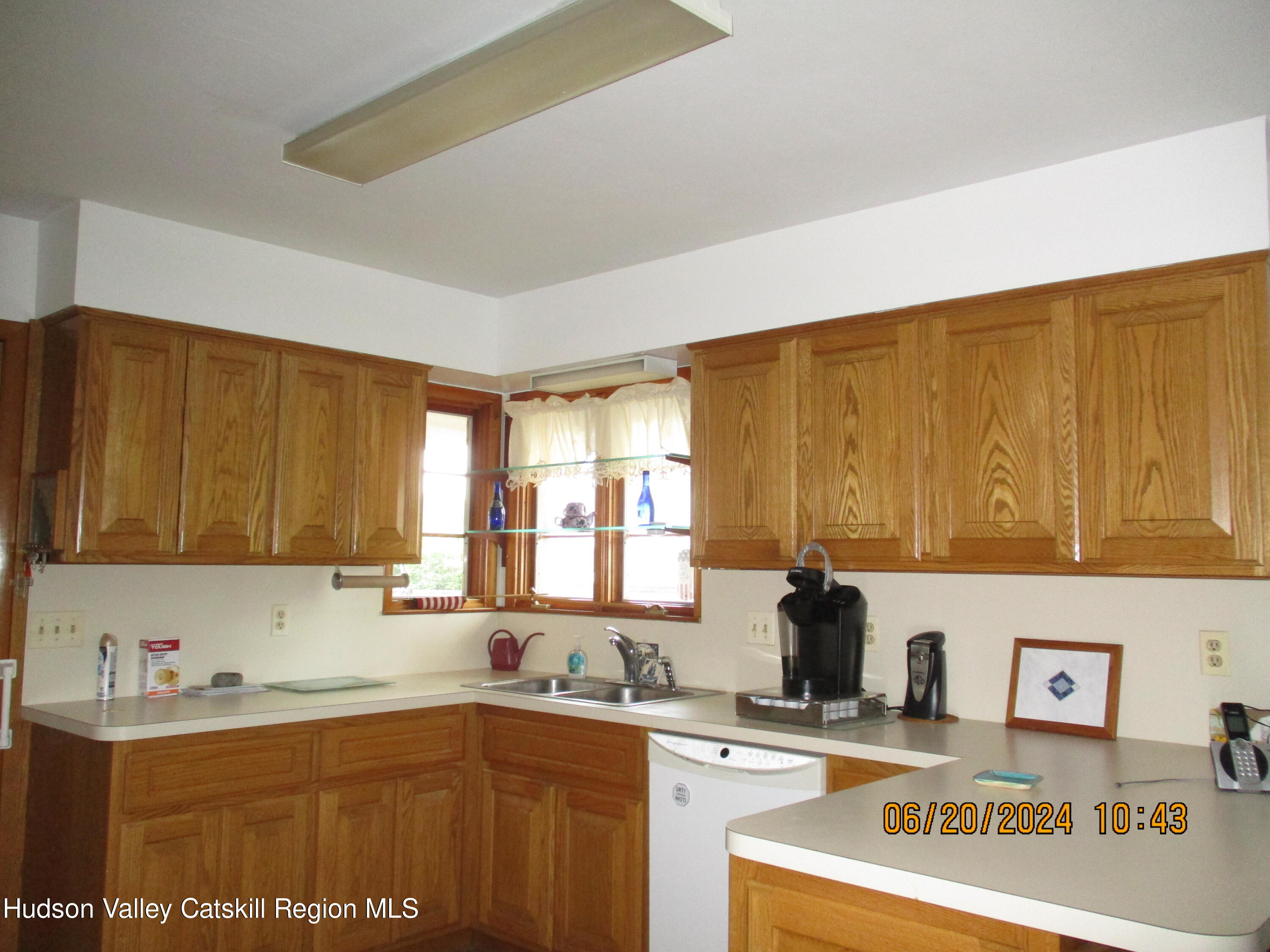 611 Plainfield Street Kingston, NY 12401 - Photo 6 of 27 a view of a kitchen with sink cabinets and window