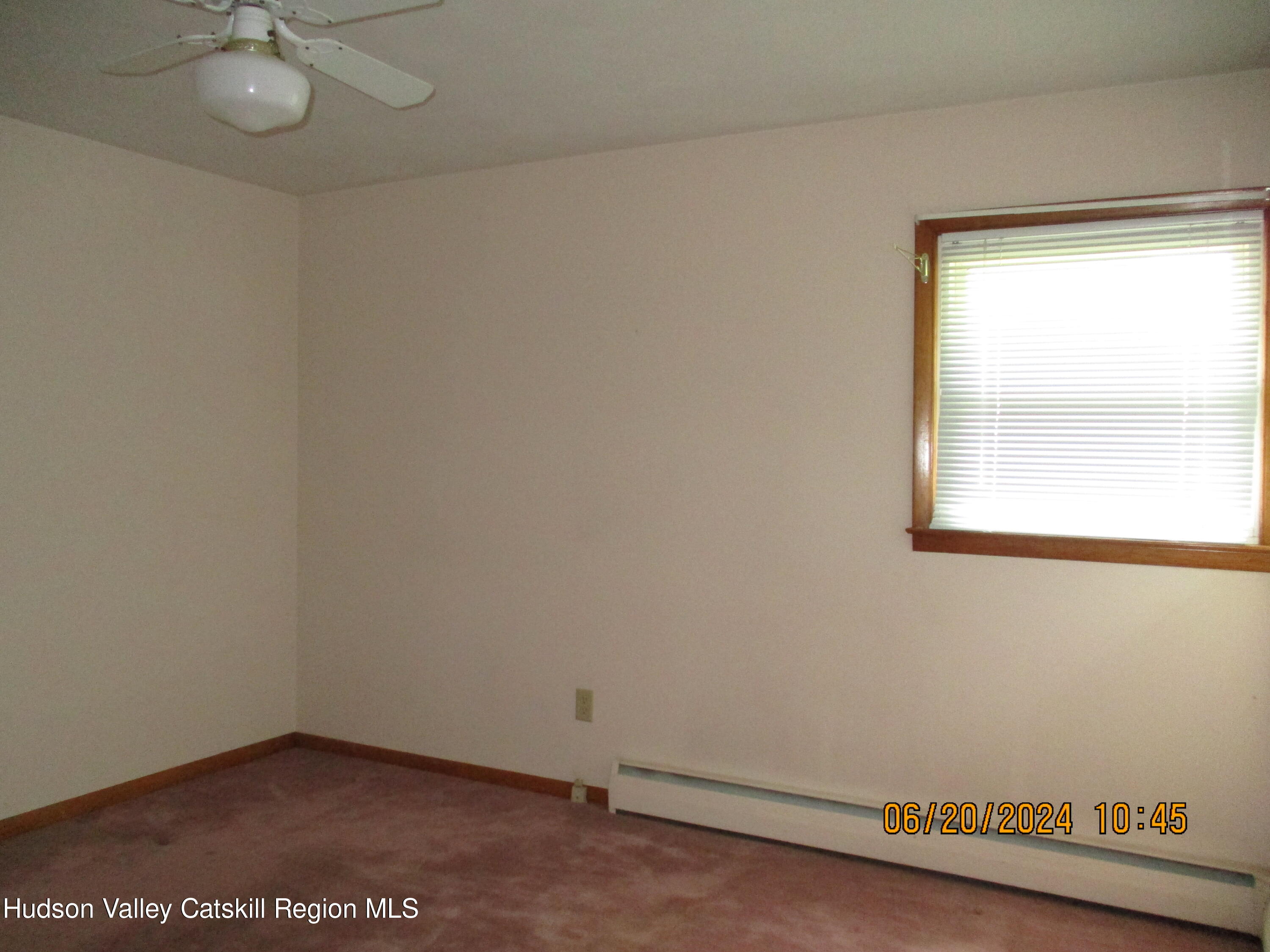 611 Plainfield Street Kingston, NY 12401 - Photo 9 of 27 an empty room with a window