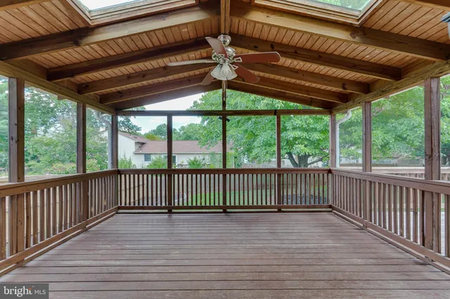 a view of a wooden deck with a outdoor space