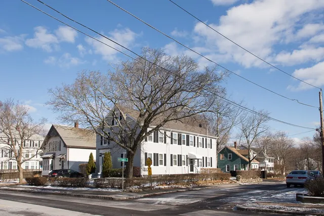a view of a city street from a building