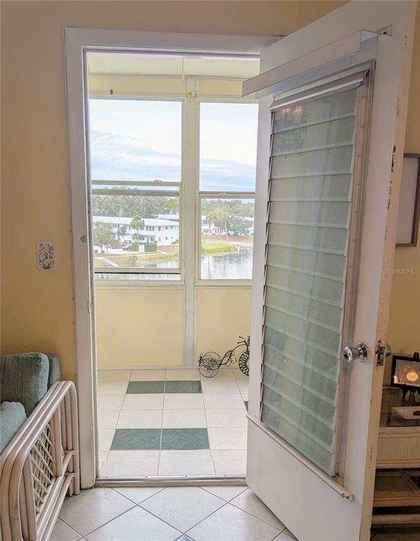 8055 112th Street North, Unit 403 Seminole, FL 33772 - Photo 22 of 37 a bathroom with a tub a sink and a shower