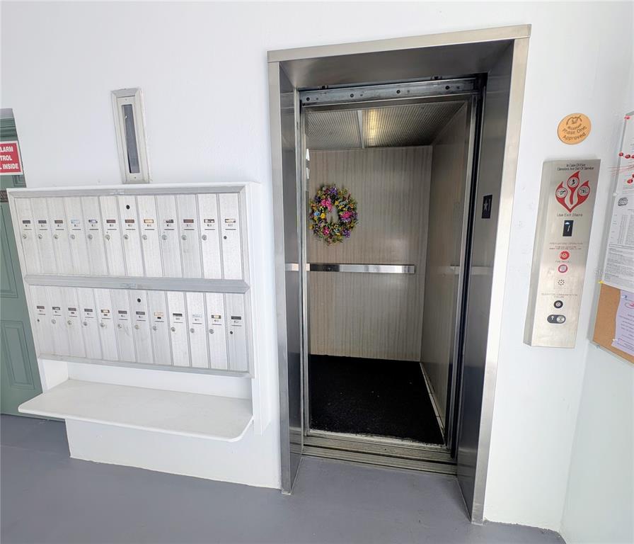8055 112th Street North, Unit 403 Seminole, FL 33772 - Photo 27 of 37 a bathroom with a bathtub and a shower
