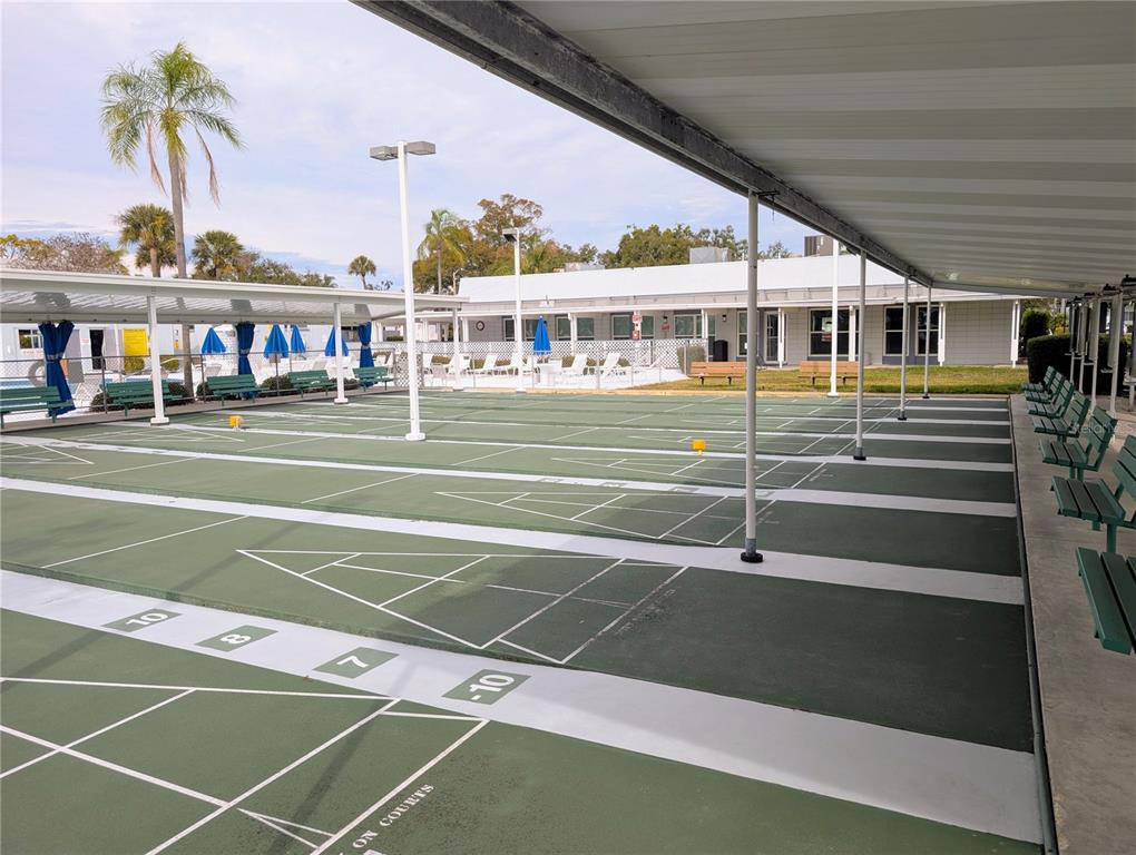 8055 112th Street North, Unit 403 Seminole, FL 33772 - Photo 34 of 37 a view of a tennis court