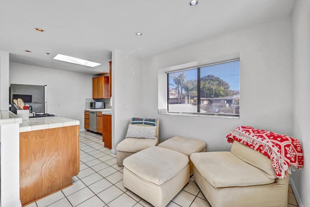 223 3rd Street Encinitas, CA 92024 - Photo 22 of 68 a living room with furniture and a window