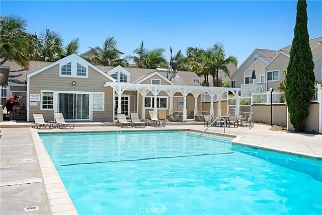 a view of a swimming pool with a patio