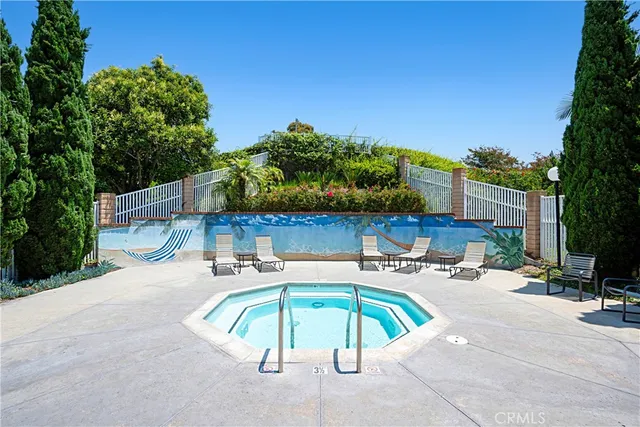 a view of a car park in front of house