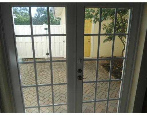 1004 Northwest 18th Avenue Boca Raton, FL 33431 - Photo 7 of 27 French door/Courtyard