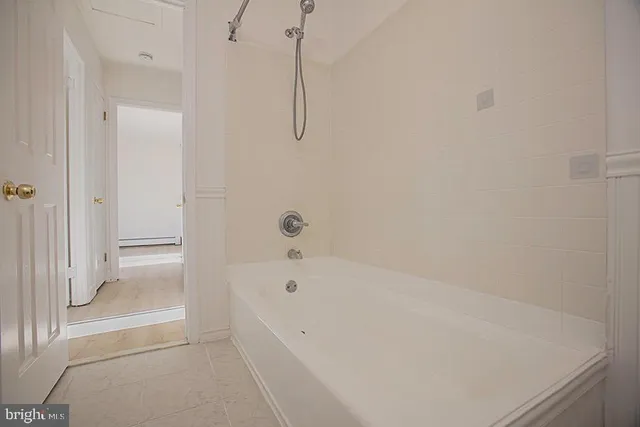 a bathroom with a bathtub