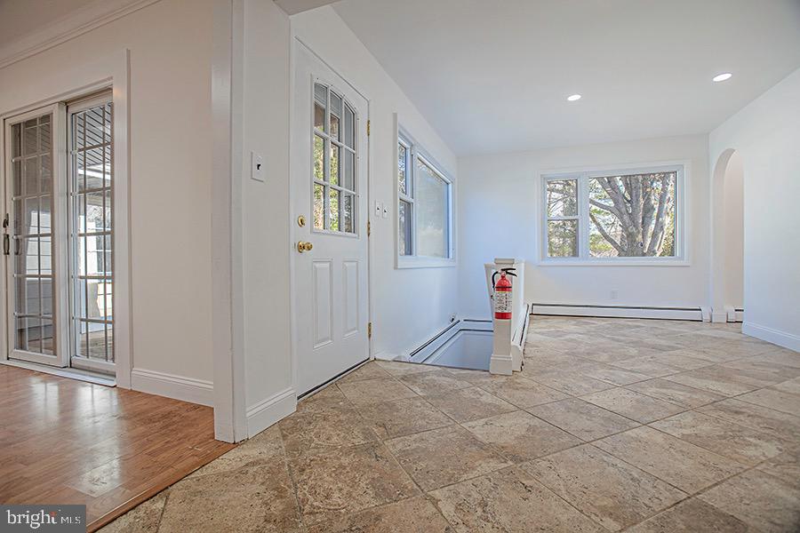 433 Walnut Lane Princeton, NJ 08540 - Photo 19 of 26 an empty room with windows and ceiling fan