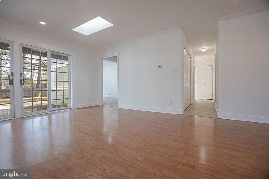 433 Walnut Lane Princeton, NJ 08540 - Photo 5 of 26 a view of an empty room with wooden floor and a window